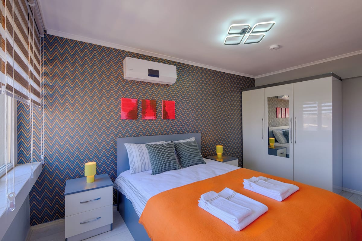 Comfort Condo, 2 Bedrooms, Pets Allowed, City View | Premium bedding, desk, laptop workspace, iron/ironing board