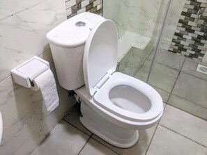 Hair dryer, towels, soap, toilet paper