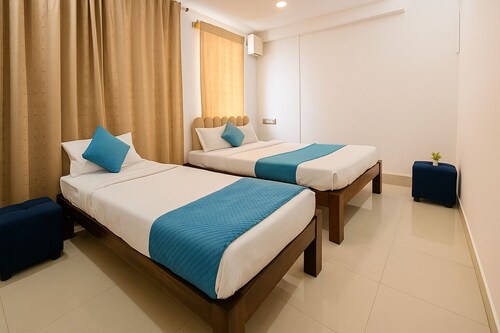 Cozy retreat 3-bedroom apartment in enchanting Mysuru with AC