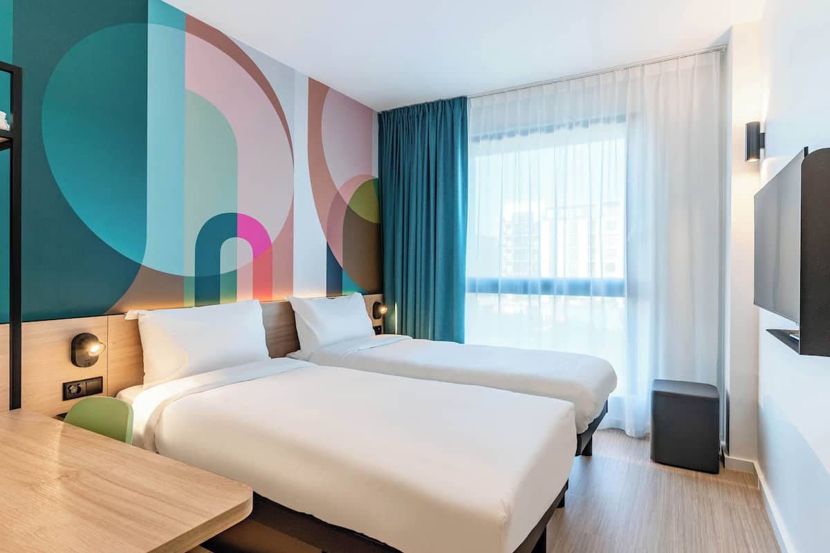 Twin Room | Hypo-allergenic bedding, laptop workspace, blackout curtains