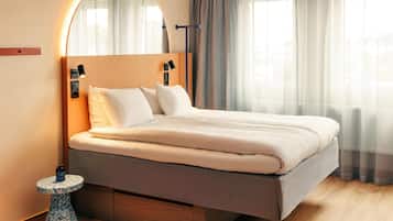Habitación, 1 cama de matrimonio | Caja fuerte, wifi gratis, ropa de cama