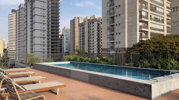 Outdoor pool, pool umbrellas, pool loungers