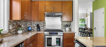 Modern 3BR + loft retreat with hot tub, fire pit, and stunning city/mountain views