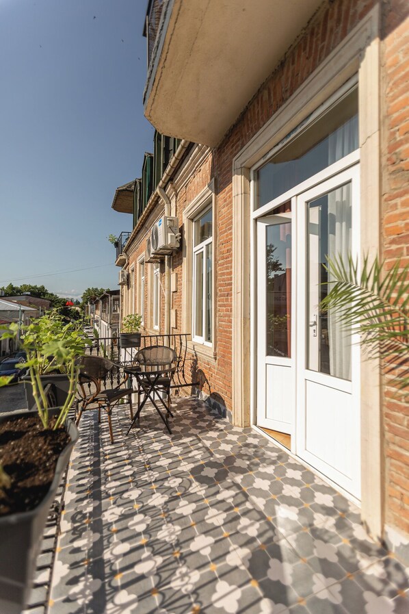 Quarto casal luxo, 1 cama King | Terraço/pátio