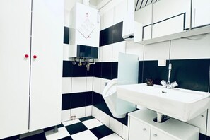 Shower, hair dryer, soap, shampoo