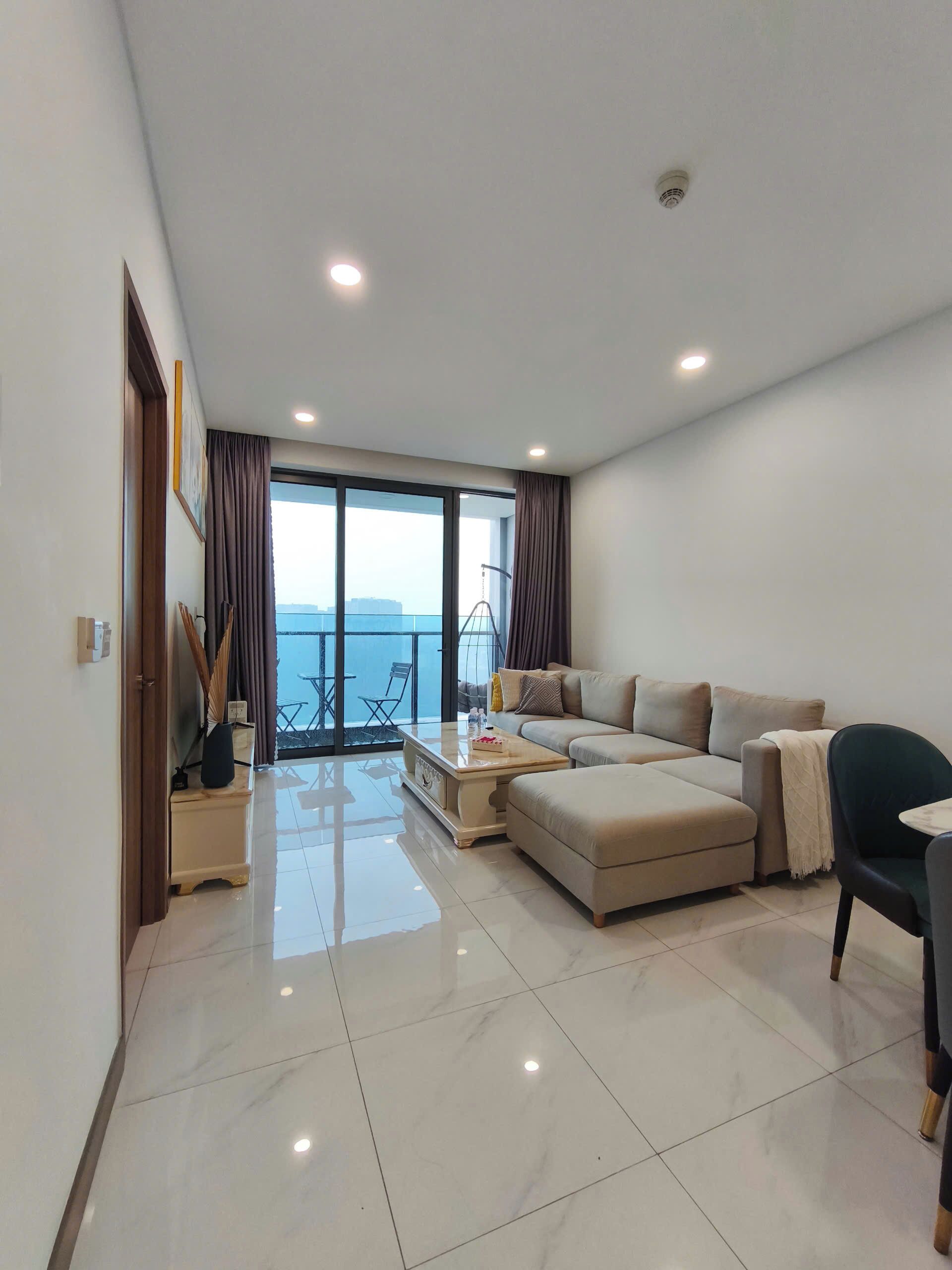 Deluxe Apartment, 2 Bedrooms, City View | Living area | 100-inch LED TV with cable channels