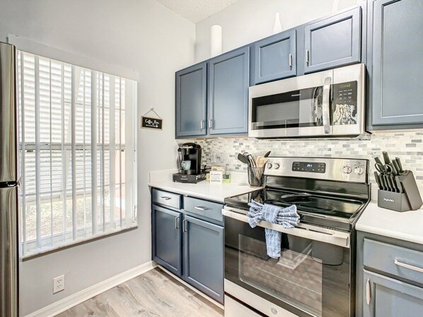 Townhome, 3 Bedrooms | Private kitchen | Fridge, coffee/tea maker, toaster