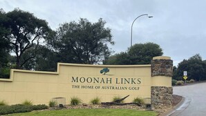 A sign for Moonah Links, The Home of Australian Golf, with a stone pillar and a grassy area in front. - Coastal Cove Suite with balcony - close to hot springs. (Fingal)