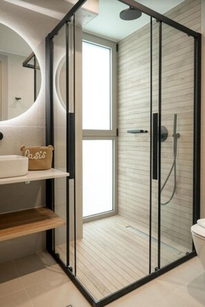 Shower, hair dryer, towels, soap