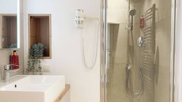 Hair dryer, towels, soap, shampoo
