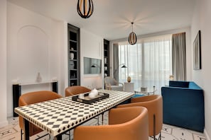 Room, 1 Bedroom | Living area | 50-inch Smart TV with digital channels