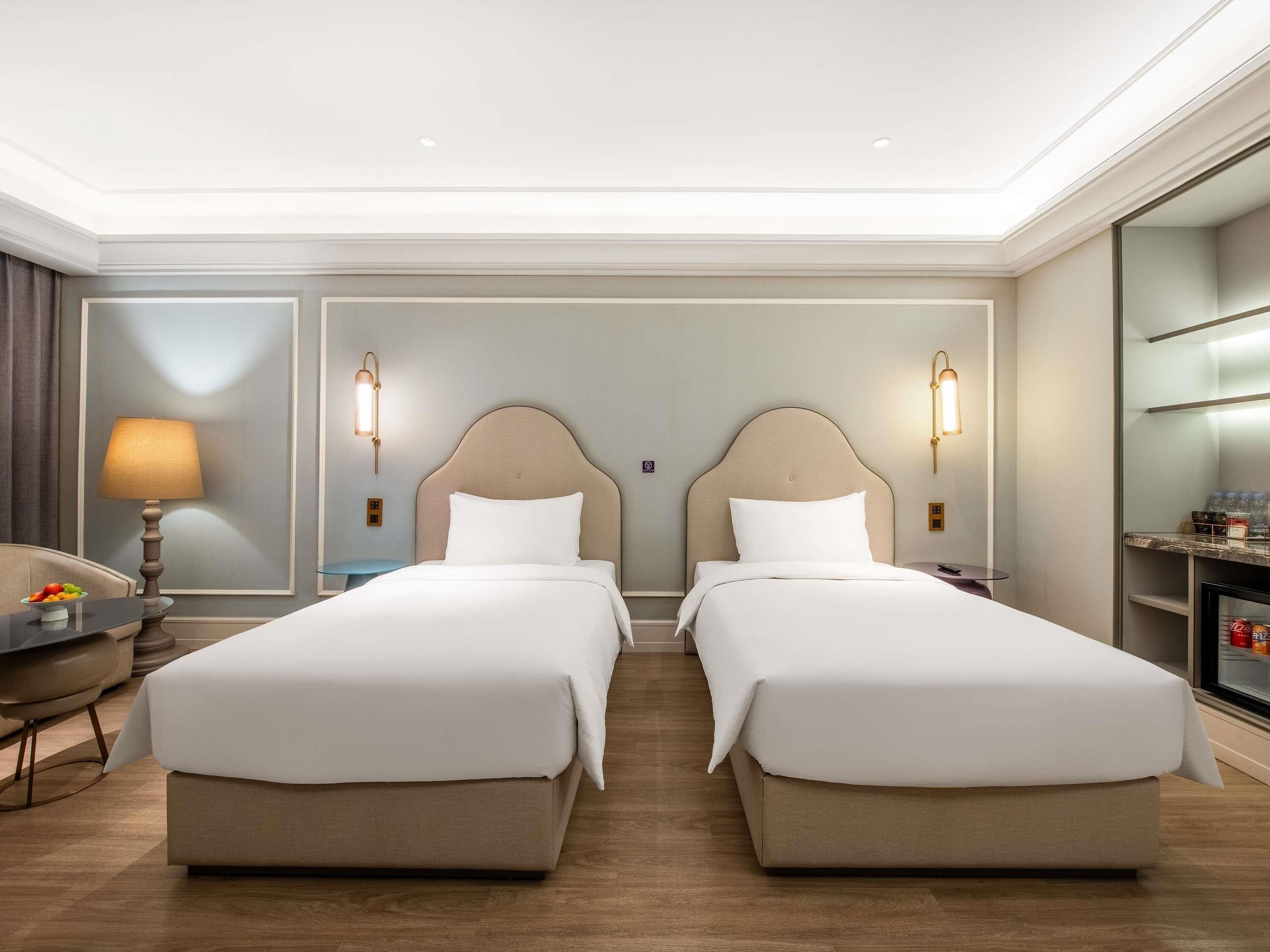 Habitación Deluxe, 2 camas individuales | Ropa de cama de alta calidad y edredones de plumas