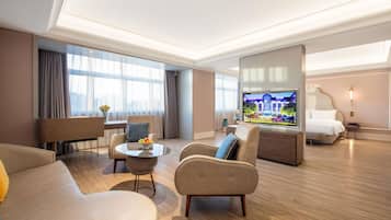Deluxe Suite, 1 King Bed | Premium bedding, down duvets, free minibar, in-room safe