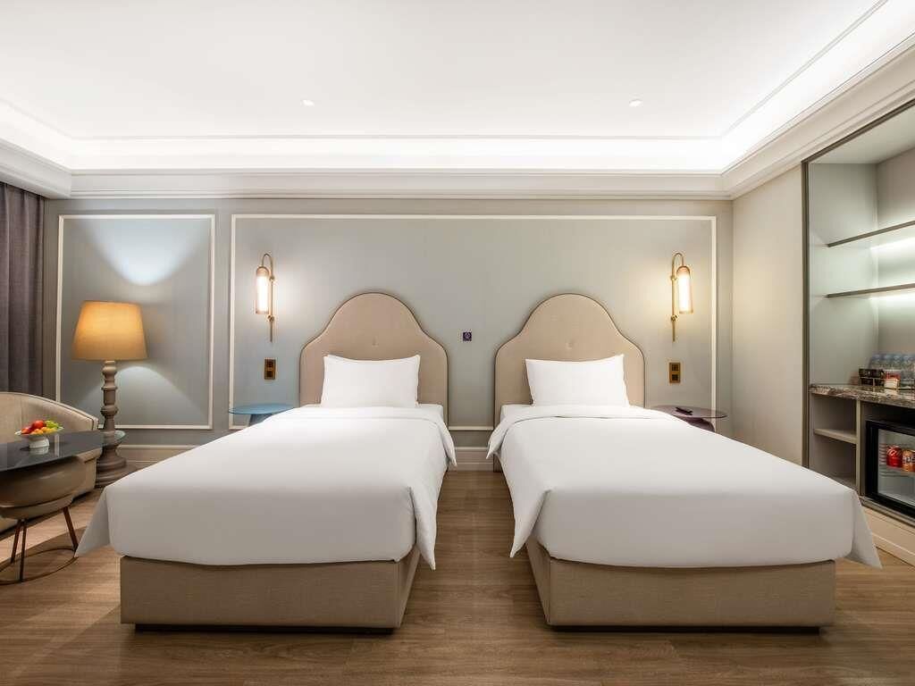 Habitación Deluxe, 2 camas individuales | Ropa de cama de alta calidad y edredones de plumas