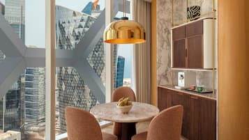 One Bedroom Signature Suite | Living area | Smart TV, first-run movies