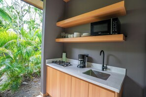 Fridge, stovetop, coffee/tea maker, cookware/dishes/utensils