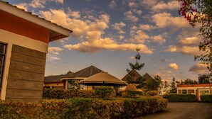 A residential area with a house, a covered patio, and a garden. - Katani Resort  (Mlolongo)