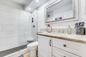 Shower, hair dryer, towels