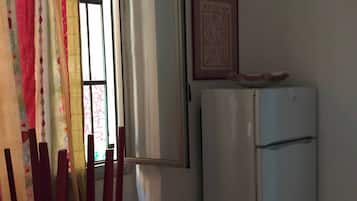 Loft, 1 Bedroom, Patio, City View | Living area | Books