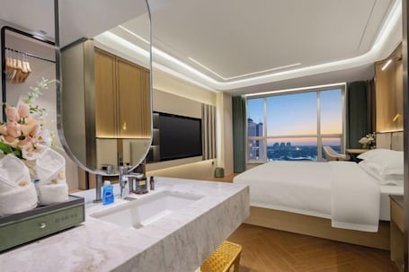 Habitación. Phoenix Court Hotel (Jingzhou Ancient City Changjiang University)