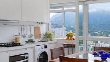 Fridge, oven, coffee/tea maker, cookware/dishes/utensils