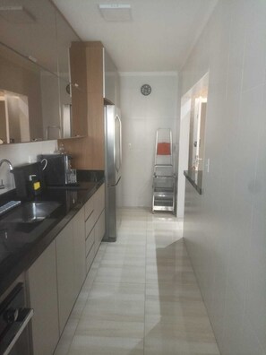 Private kitchen - 1-High standard and sophistication beach, the best apartment, comfort, luxury and view (Vila Caiçara Praia Grande)
