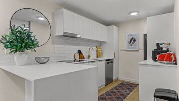 Coffee/tea maker, fridge, microwave, oven
