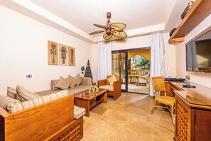 Junior Suite | Living area | 32-inch flat-screen TV with satellite channels - Grand Waterworld Makadi couples and families only (Makadi Bay)