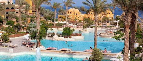 8 outdoor pools, pool umbrellas, lifeguards on site