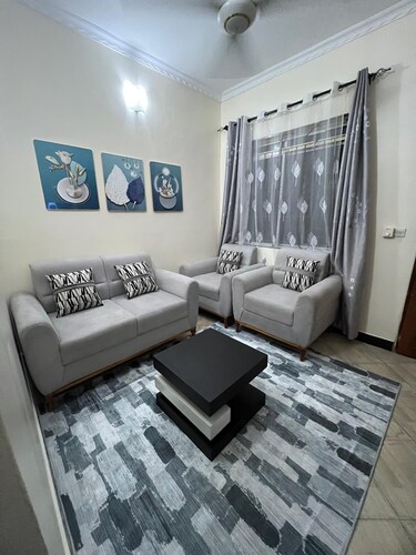 “Chic City Escape Apartment with AC, Smart TV & Free Breakfast in Dar es Salaam"