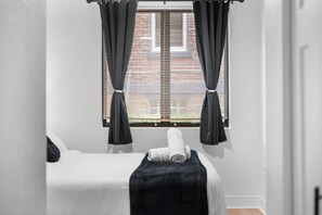 3 bedrooms, desk, iron/ironing board, travel cot