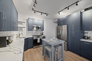Coffee/tea maker, fridge, microwave, oven