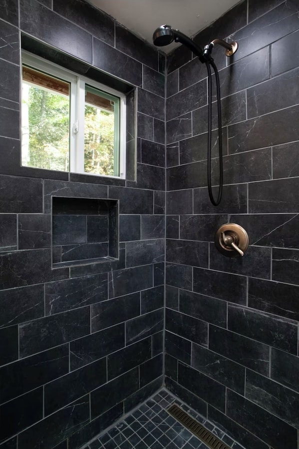 Shower, towels, soap, toilet paper