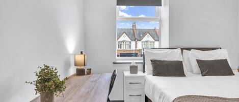 2 bedrooms, desk, iron/ironing board, travel cot