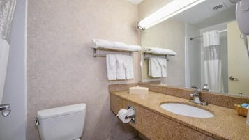 Single Room, 1 King Bed | Bathroom | Free toiletries, hair dryer, towels, soap