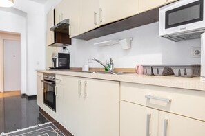 Microwave, oven, stovetop, coffee/tea maker