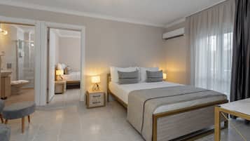 Family Room, 2 Bedrooms | Premium bedding, minibar, free WiFi, bed sheets