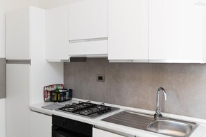 Fridge, stovetop, coffee/tea maker, toaster
