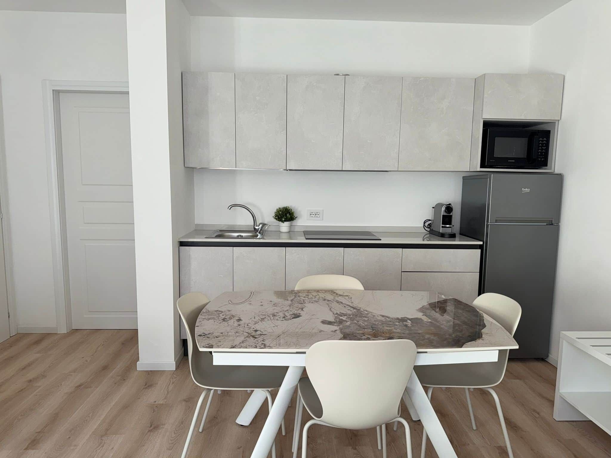 Fridge, microwave, stovetop, cookware/dishes/utensils