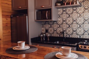 Fridge, microwave, oven, cookware/dishes/utensils