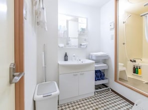 Hair dryer, bidet, towels, soap
