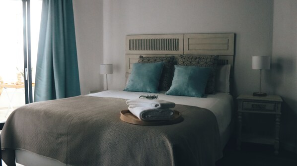 1 habitación, tabla de planchar con plancha, wifi y ropa de cama 