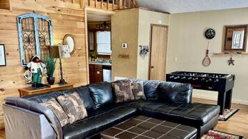 Smart TV, fireplace, foosball