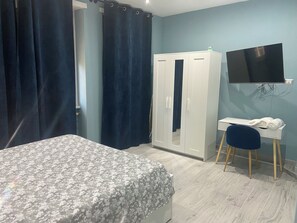 2 habitaciones, tabla de planchar con plancha, wifi y ropa de cama 
