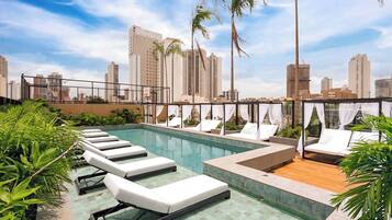 Indoor pool, outdoor pool, pool umbrellas, sun loungers