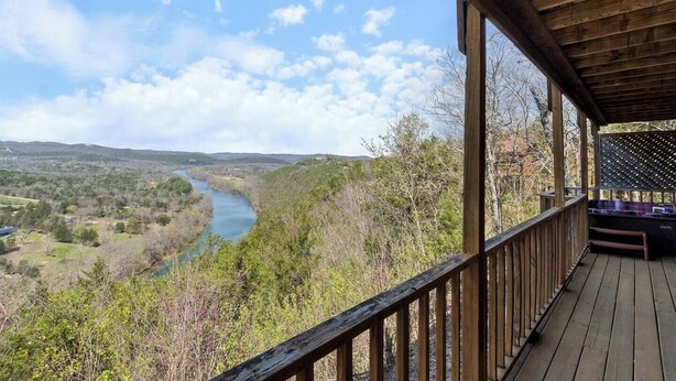 A wooden deck overlooking a river with a view of the surrounding landscape. - River View, Sleeps 6, Hot Tub (Carroll County)