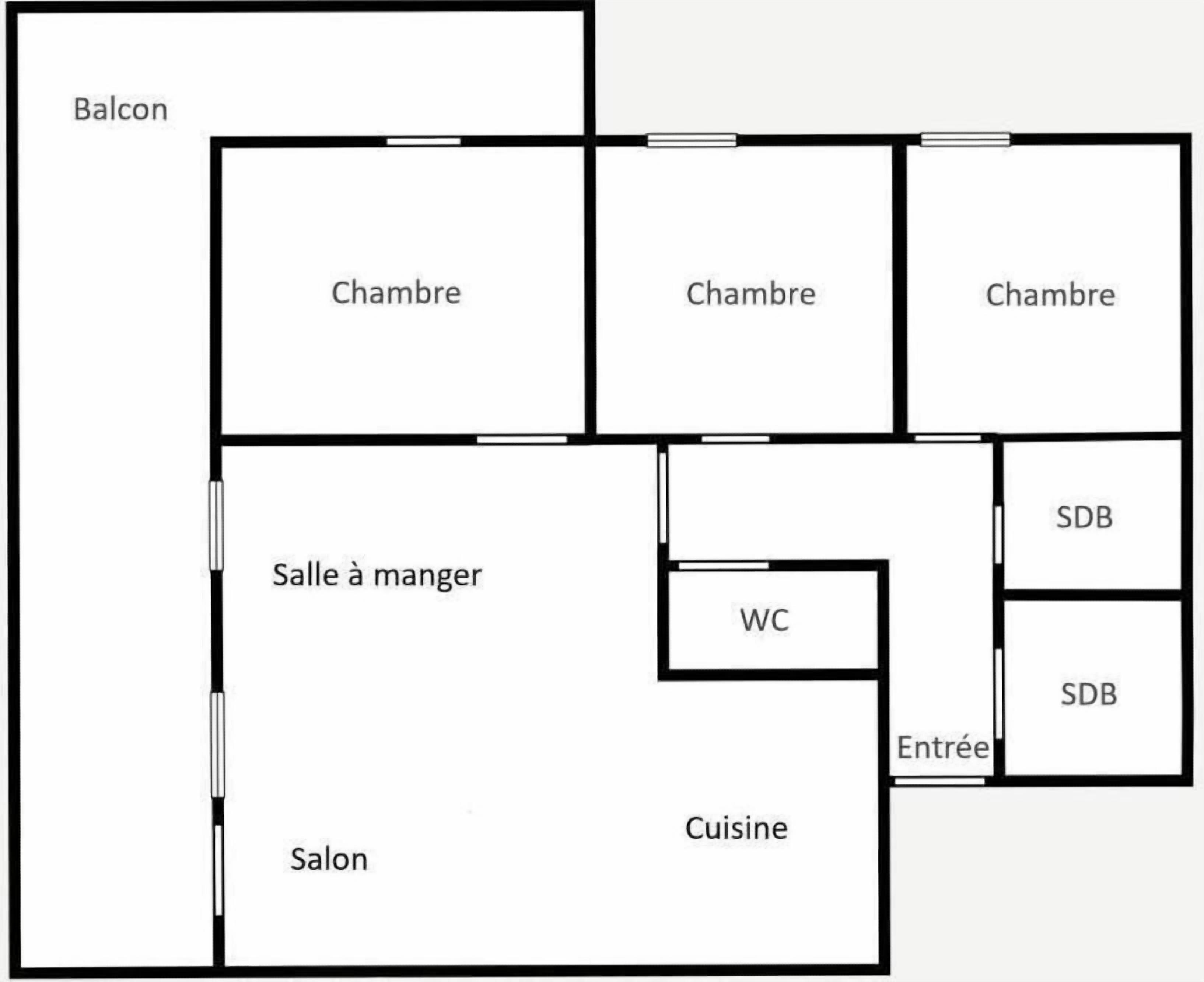 Plànol d'un hotel amb balcó, tres habitacions, menjador, cuina, bany i un petit lavabo.