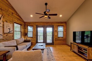 TV - Cozy Chic Cabin Retreat on 7 acres with hot tub. Pet-friendly. (Epworth)