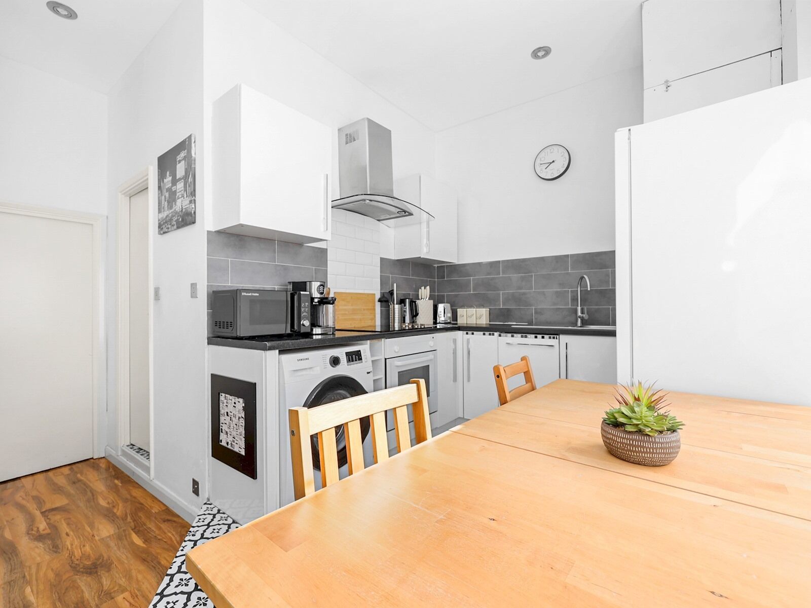 Fridge, oven, dishwasher, dining tables