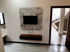 Basic Triple Room, Multiple Beds, Non Smoking, Air conditioning | In-room safe, blackout drapes, iron/ironing board, free WiFi